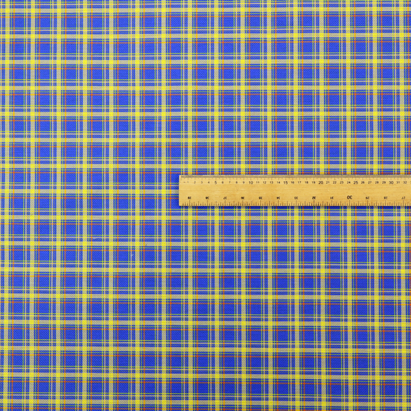 A bright blue plaid fabric pattern featuring a tight, repeating grid of intersecting yellow stripes and thin orange accent lines.
