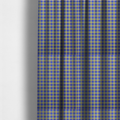 The fabric used to create these made-to-measure curtains is a bright blue plaid fabric pattern featuring a tight, repeating grid of intersecting yellow stripes and thin orange accent lines.