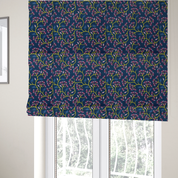 The fabric used to create these Roman blinds is a deep blue fabric pattern featuring a winding trail of bright yellow vines accented with clusters of pink and white flowers and blue fern leaves.