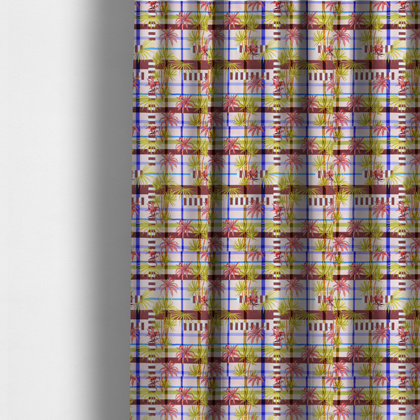 The fabric used to create these made-to-measure curtains is a eclectic, geometric tropical fabric pattern featuring a unique overlay design. The background is a structured windowpane plaid layout composed of intersecting lines in cobalt blue, olive green, and chocolate brown across a dusty pink base. Layered over this grid is a repeating botanical print of tropical plants, featuring fan palms in lime green and slender fronds in terracotta pink.