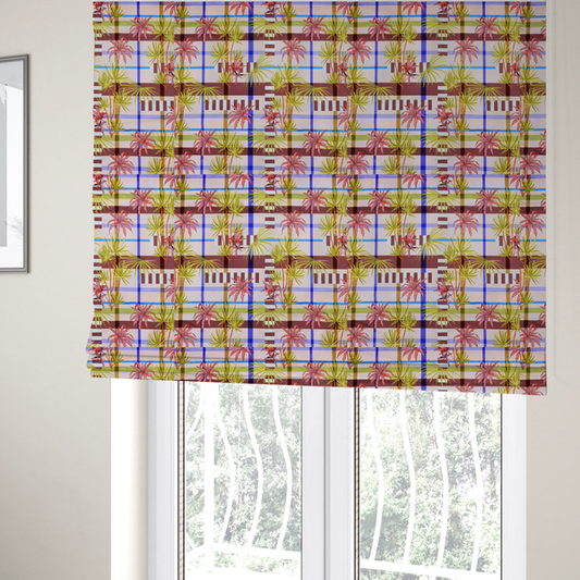 The fabric used to create these Roman blinds is a eclectic, geometric tropical fabric pattern featuring a unique overlay design. The background is a structured windowpane plaid layout composed of intersecting lines in cobalt blue, olive green, and chocolate brown across a dusty pink base. Layered over this grid is a repeating botanical print of tropical plants, featuring fan palms in lime green and slender fronds in terracotta pink.