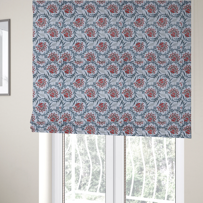 The fabric used to create these Roman blinds is a ornate, traditional Kalamkari-style pattern of swirling grey vines and large lotus-like flowers with red and white petals on a light grey background.