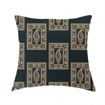 The fabric used to create this handmade cushion is a featuring a traditional repeating pattern of detailed white and gold paisley motifs, each enclosed within an ornate rectangular border on a charcoal black background.