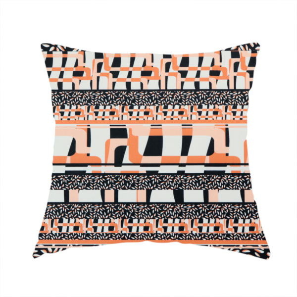 The fabric used to create this handmade cushion is a featuring a bold, multi-patterned horizontal striped design with alternating bands of geometric coral and cream blocks and dense black-and-white micro leaf speckles.