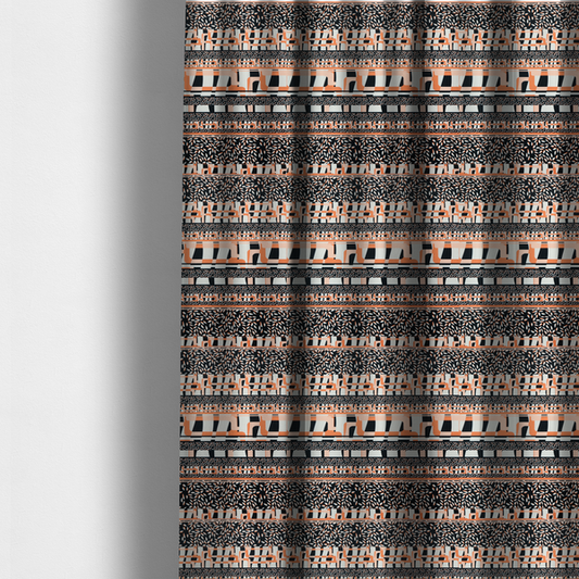 The fabric used to create these made-to-measure curtains is a featuring a bold, multi-patterned horizontal striped design with alternating bands of geometric coral and cream blocks and dense black-and-white micro leaf speckles.