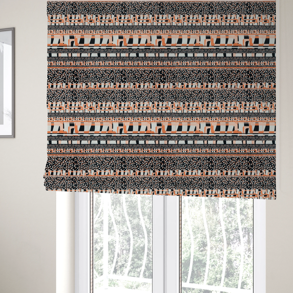 The fabric used to create these Roman blinds is a featuring a bold, multi-patterned horizontal striped design with alternating bands of geometric coral and cream blocks and dense black-and-white micro leaf speckles.