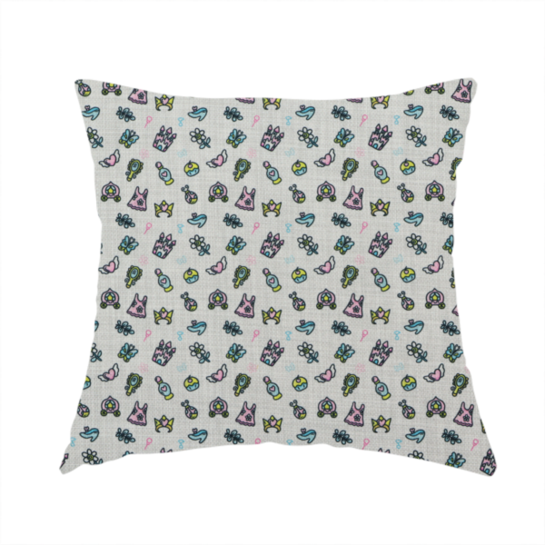 The fabric used to create this handmade cushion is a featuring a whimsical, miniature repeating pattern of pastel princess-themed doodles—including castles, carriages, and crowns—on a light grey linen-textured background.