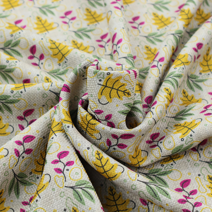Fabric featuring a whimsical, Scandinavian-style botanical print with rows of tiny yellow oak leaves, magenta sprigs, and green foliage on a light grey linen-textured background.