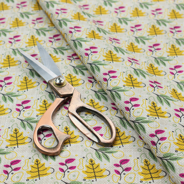 Fabric featuring a whimsical, Scandinavian-style botanical print with rows of tiny yellow oak leaves, magenta sprigs, and green foliage on a light grey linen-textured background.