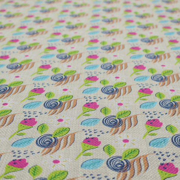 Fabric featuring a whimsical, hand-drawn botanical pattern of small pink flower buds, blue spiral circles, and bright green leaves on a light grey linen-textured background.