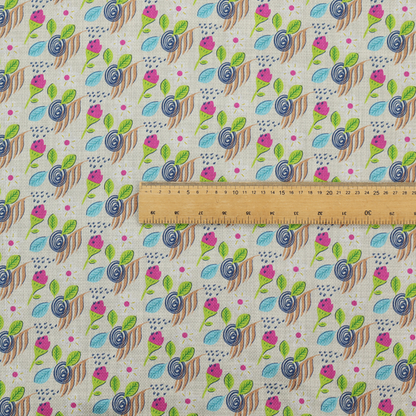 Fabric featuring a whimsical, hand-drawn botanical pattern of small pink flower buds, blue spiral circles, and bright green leaves on a light grey linen-textured background.
