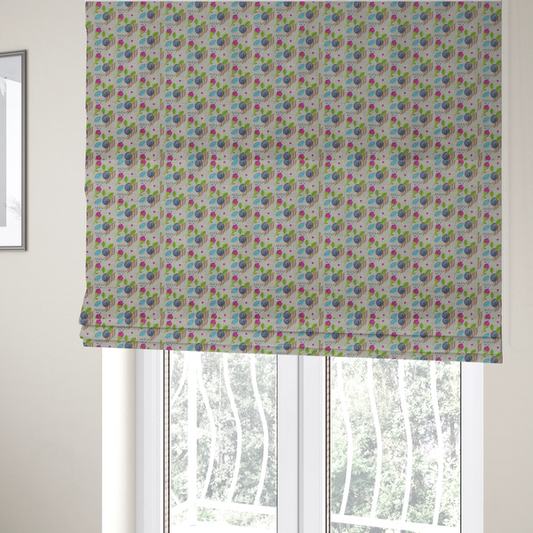 The fabric used to create these Roman blinds is a featuring a whimsical, hand-drawn botanical pattern of small pink flower buds, blue spiral circles, and bright green leaves on a light grey linen-textured background.