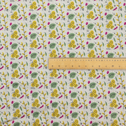 Fabric featuring a whimsical, Scandinavian-style botanical print with rows of tiny yellow butterflies, leafy green foliage, and magenta accents on a light grey linen-textured background.