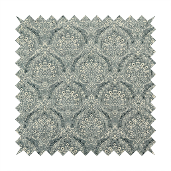 An intricate, repeating damask and paisley design.