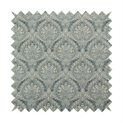 An intricate, repeating damask and paisley design.