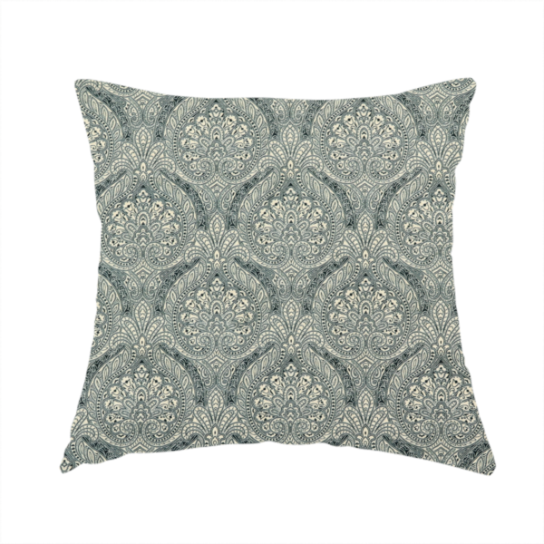 The fabric used to create this handmade cushion is a intricate, repeating damask and paisley design.