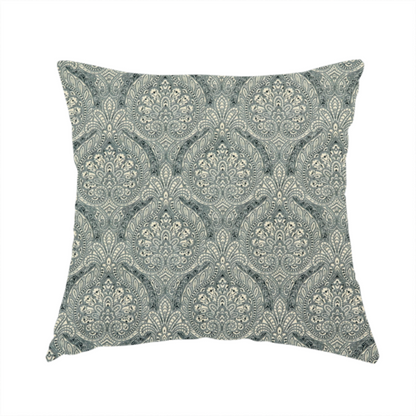 The fabric used to create this handmade cushion is a intricate, repeating damask and paisley design.