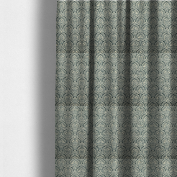 The fabric used to create these made-to-measure curtains is a intricate, repeating damask and paisley design.