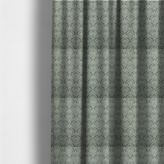 The fabric used to create these made-to-measure curtains is a intricate, repeating damask and paisley design.