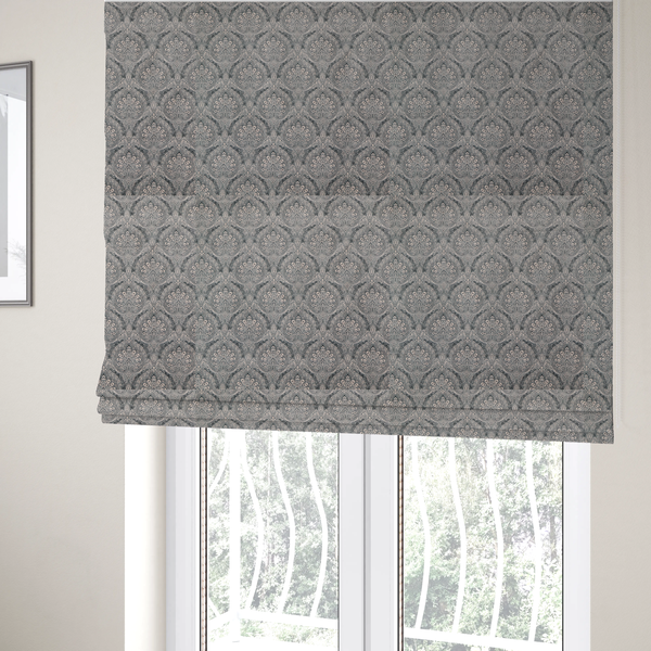 The fabric used to create these Roman blinds is a intricate, repeating damask and paisley design on fabric, featuring elegant, symmetrical motifs.