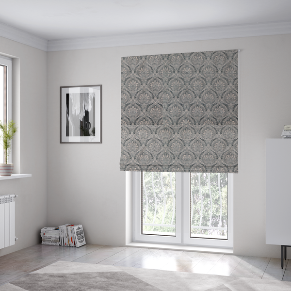 The fabric used to create these Roman blinds is a intricate, repeating damask and paisley design on fabric, featuring elegant, symmetrical motifs.