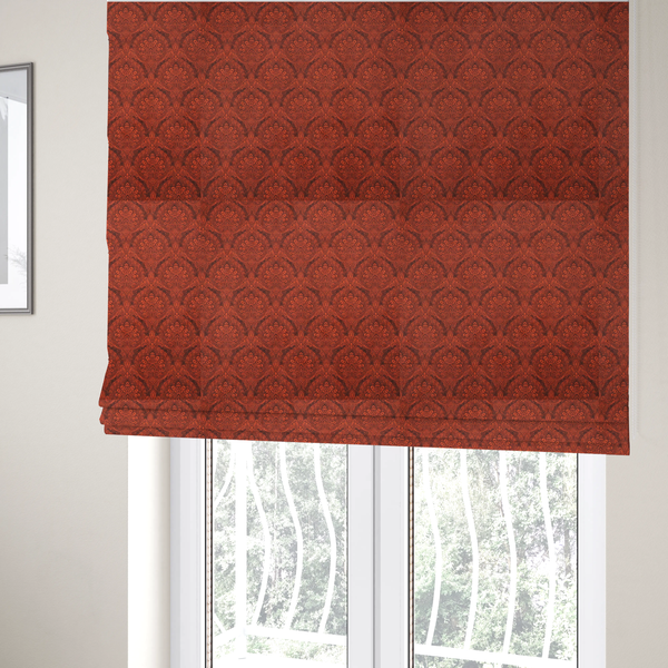 The fabric used to create these Roman blinds is a intricate, repeating damask and paisley design on fabric, featuring elegant, symmetrical motifs.