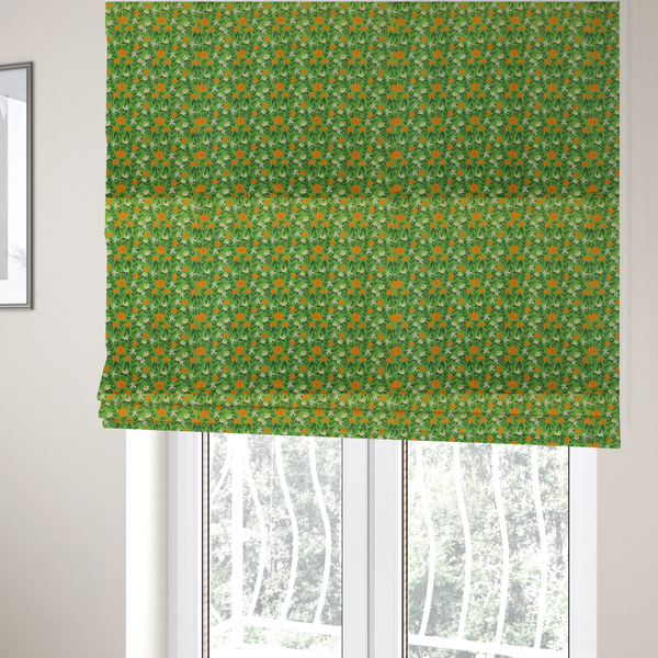 The fabric used to create these Roman blinds is a bright green fabric featuring a dense, repeating pattern of small orange flowers, delicate white blossoms, and dark green leaves.