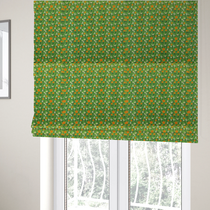 The fabric used to create these Roman blinds is a bright green fabric featuring a dense, repeating pattern of small orange flowers, delicate white blossoms, and dark green leaves.