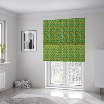 The fabric used to create these Roman blinds is a bright green fabric featuring a dense, repeating pattern of small orange flowers, delicate white blossoms, and dark green leaves.