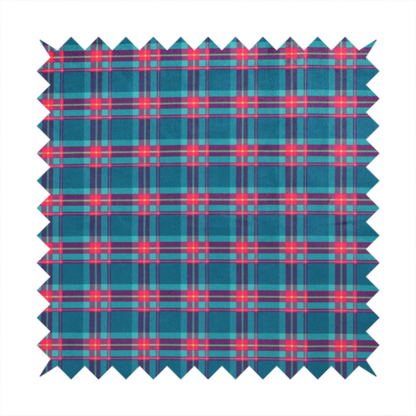 Vibrant teal and pink tartan plaid fabric featuring a classic checked pattern with intersecting lines in rich turquoise, bright magenta, and subtle yellow highlights.