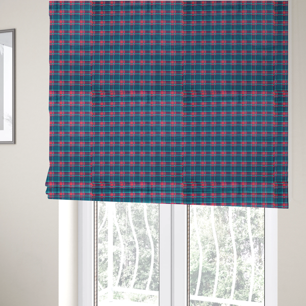 The fabric used to create these Roman blinds is a vibrant teal and pink tartan plaid fabric featuring a classic checked pattern with intersecting lines in rich turquoise, bright magenta, and subtle yellow highlights.