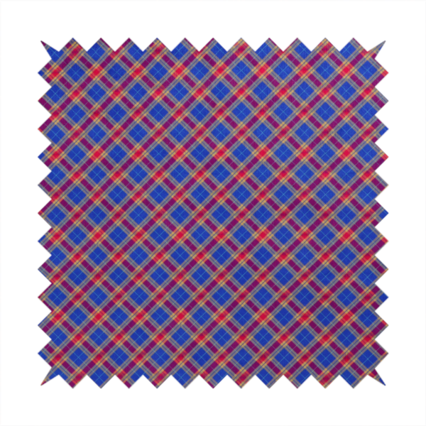 Vibrant blue and red diamond plaid fabric featuring an intricate diagonal checked pattern with intersecting lines in rich royal blue, bright red, and yellow highlights.