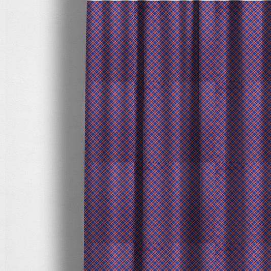The fabric used to create these made-to-measure curtains is a vibrant blue and red diamond plaid fabric featuring an intricate diagonal checked pattern with intersecting lines in rich royal blue, bright red, and yellow highlights.