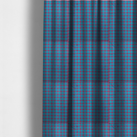 The fabric used to create these made-to-measure curtains is a bright turquoise and red plaid fabric featuring a classic checked pattern with intersecting lines in rich turquoise, vibrant red, and dark blue accents.
