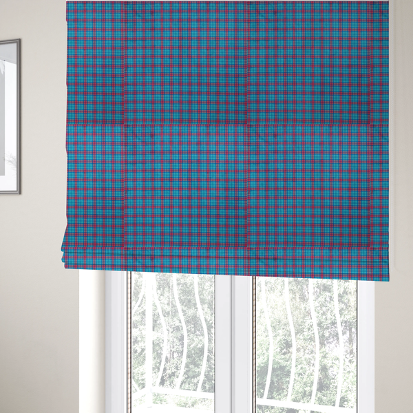The fabric used to create these Roman blinds is a bright turquoise and red plaid fabric featuring a classic checked pattern with intersecting lines in rich turquoise, vibrant red, and dark blue accents.