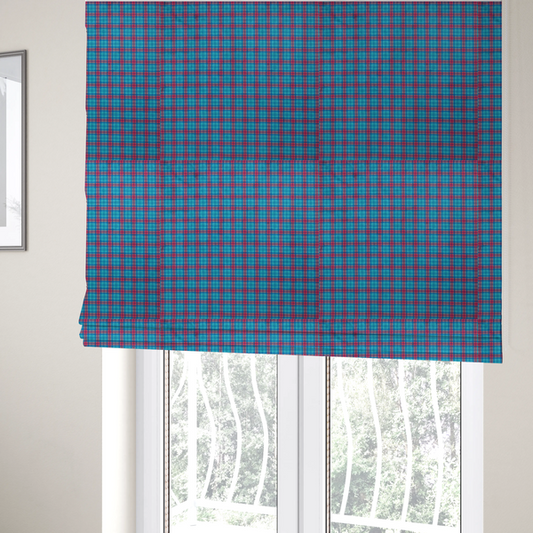 The fabric used to create these Roman blinds is a bright turquoise and red plaid fabric featuring a classic checked pattern with intersecting lines in rich turquoise, vibrant red, and dark blue accents.