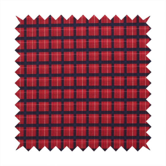 Bold red and navy plaid fabric featuring a structured checked pattern with prominent dark navy grids, vibrant red blocks, and subtle white pin lines.