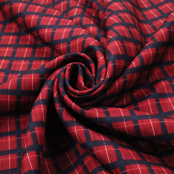 Bold red and navy plaid fabric featuring a structured checked pattern with prominent dark navy grids, vibrant red blocks, and subtle white pin lines.