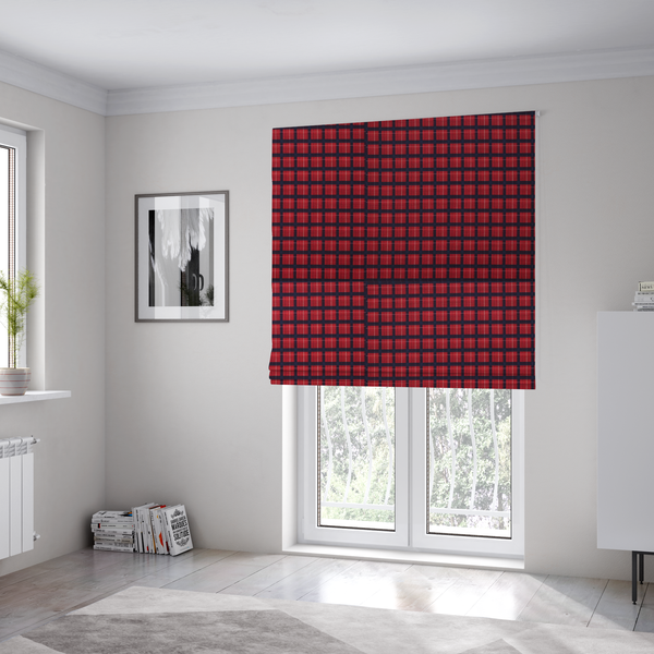 The fabric used to create these Roman blinds is a bold red and navy plaid fabric featuring a structured checked pattern with prominent dark navy grids, vibrant red blocks, and subtle white pin lines.