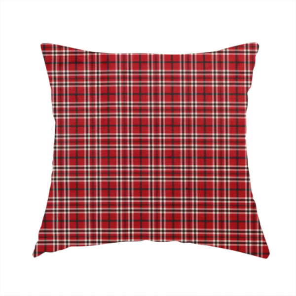 The fabric used to create this handmade cushion is a classic red and black tartan plaid fabric featuring a traditional checked pattern with intersecting lines in rich red, dark black, and subtle white highlights.