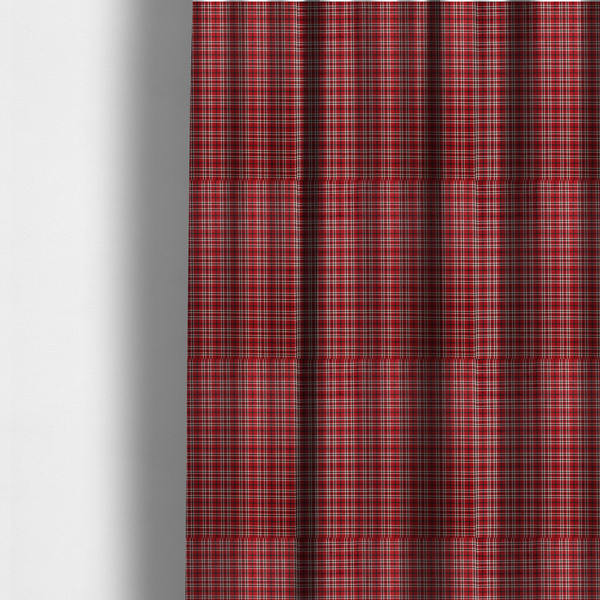 The fabric used to create these made-to-measure curtains is a classic red and black tartan plaid fabric featuring a traditional checked pattern with intersecting lines in rich red, dark black, and subtle white highlights.