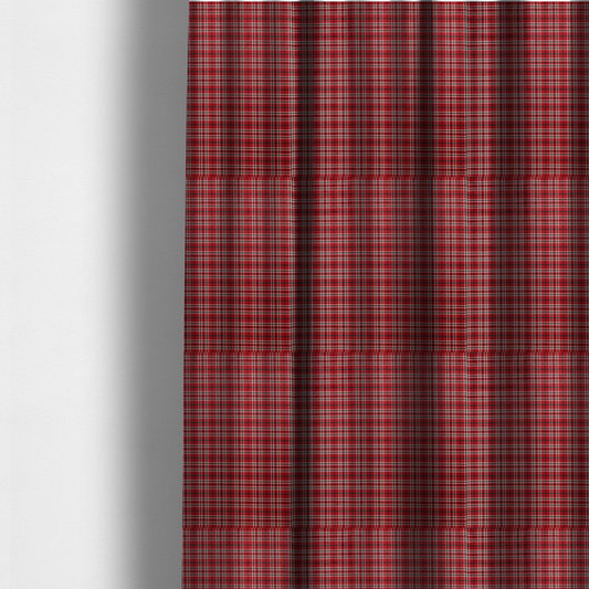 The fabric used to create these made-to-measure curtains is a classic red and black tartan plaid fabric featuring a traditional checked pattern with intersecting lines in rich red, dark black, and subtle white highlights.