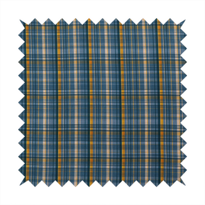Blue and gold plaid fabric featuring a structured checked pattern with intersecting lines in muted slate blue, deep navy, vibrant gold, and crisp white pin lines.
