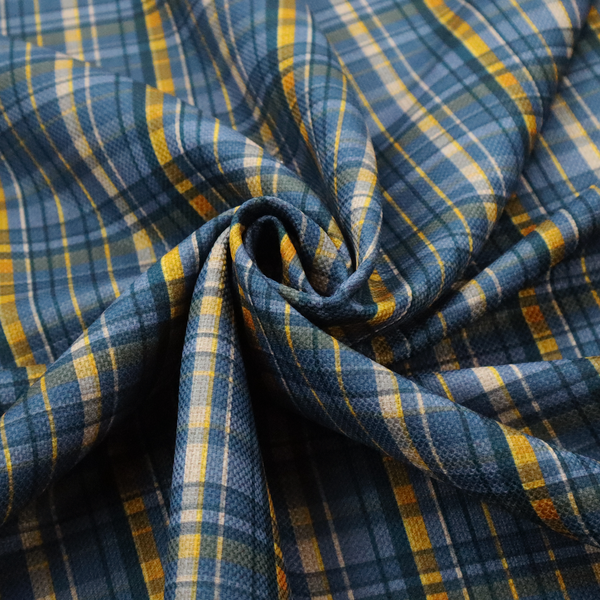 Blue and gold plaid fabric featuring a structured checked pattern with intersecting lines in muted slate blue, deep navy, vibrant gold, and crisp white pin lines.