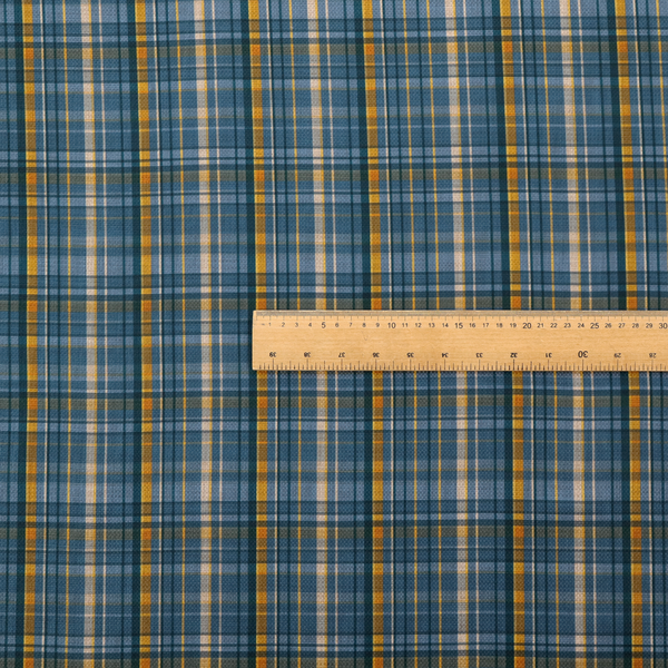 Blue and gold plaid fabric featuring a structured checked pattern with intersecting lines in muted slate blue, deep navy, vibrant gold, and crisp white pin lines.