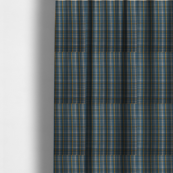 the fabric used to create these made-to-measure curtains is a blue and gold plaid fabric featuring a structured checked pattern with intersecting lines in muted slate blue, deep navy, vibrant gold, and crisp white pin lines.
