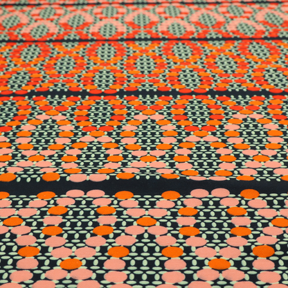 Horizontal bands of intricate geometric designs composed of small dots or bead-like shapes forming repeating lattice and chevron motifs.