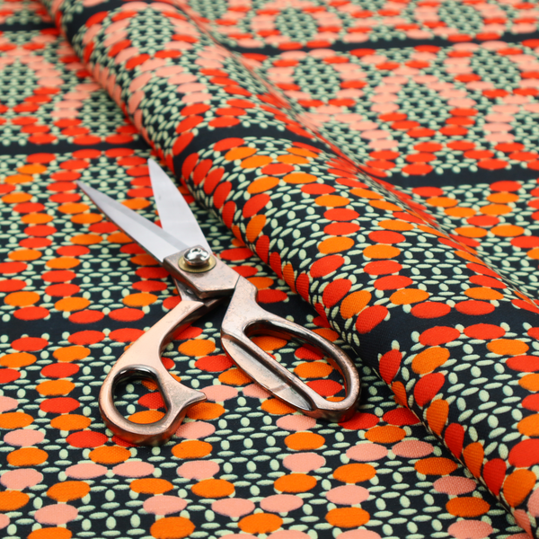Horizontal bands of intricate geometric designs composed of small dots or bead-like shapes forming repeating lattice and chevron motifs.