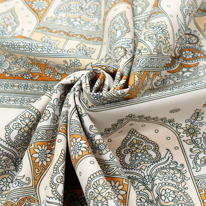An intricate, traditional Indian-inspired print featuring rows of archways filled with ornate paisleys and floral motifs, separated by decorative borders.