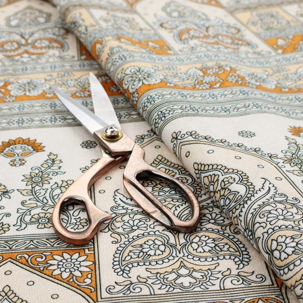 An intricate, traditional Indian-inspired print featuring rows of archways filled with ornate paisleys and floral motifs, separated by decorative borders.